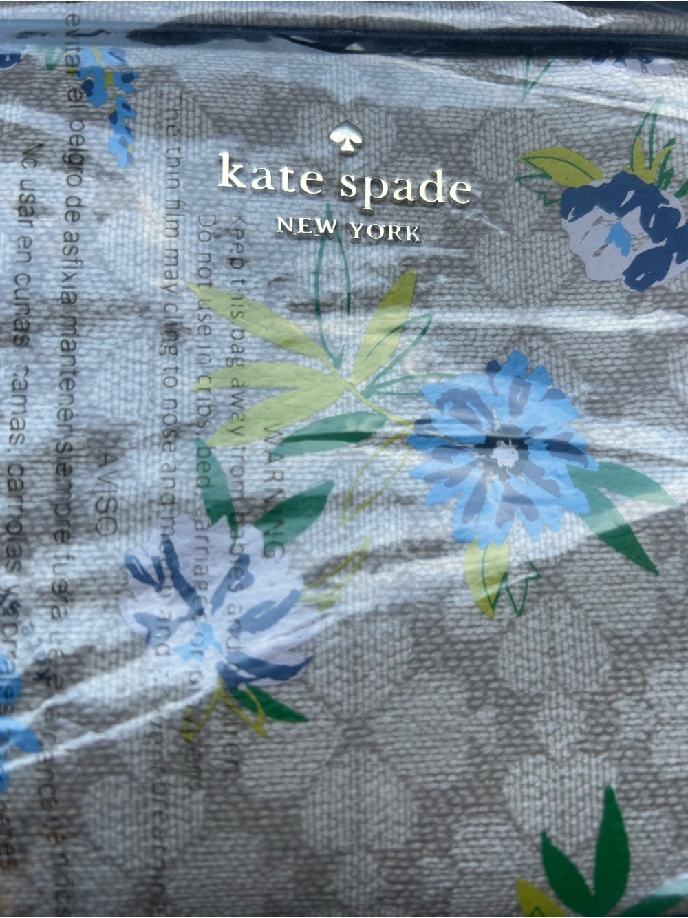 kate spade beige logo-lined handbag interior